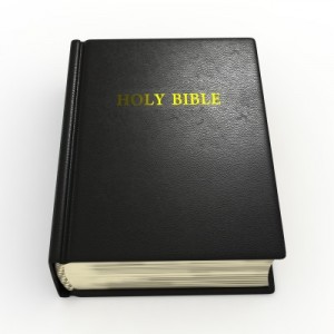Why I Don't Teach Bible - Carla Anne Coroy - a black Bible with Holy Bible written on it in gold - source 123rf